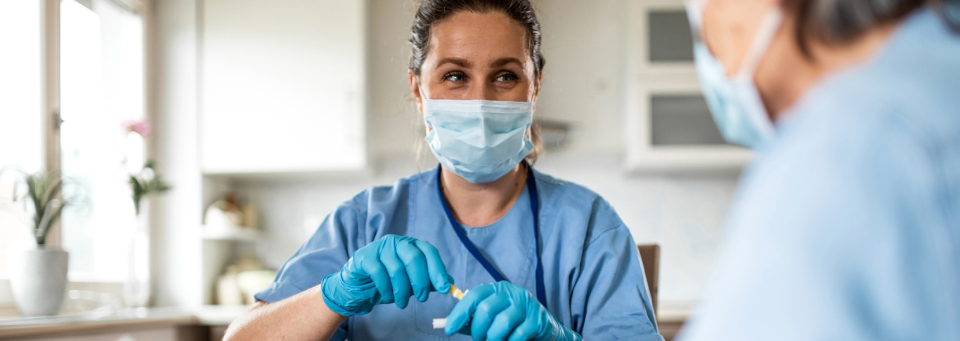 Nurse giving care to elderly